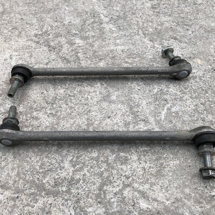 Par De Bieletas Delanteras Para Nissan Versa 2013, 2014, 2015, 2016, 2017, 2018, 2019 - Motor 1.6 Litros, 4 Cilindros - Original
